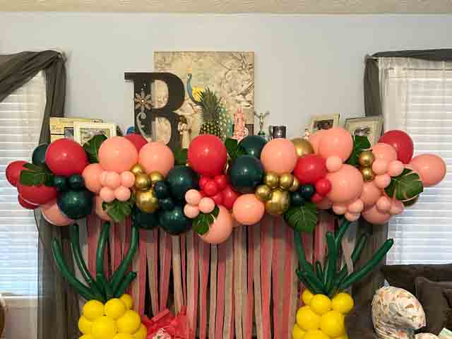 Flamingo and pineapple themed organic balloon garland