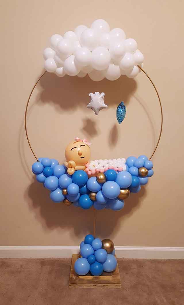 Sleeping baby balloon design with clouds on top and stars hanging down