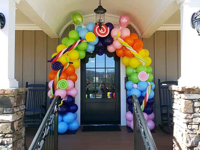 Candy Theme Balloon Arch with balloon lollipop and other balloon candy designs