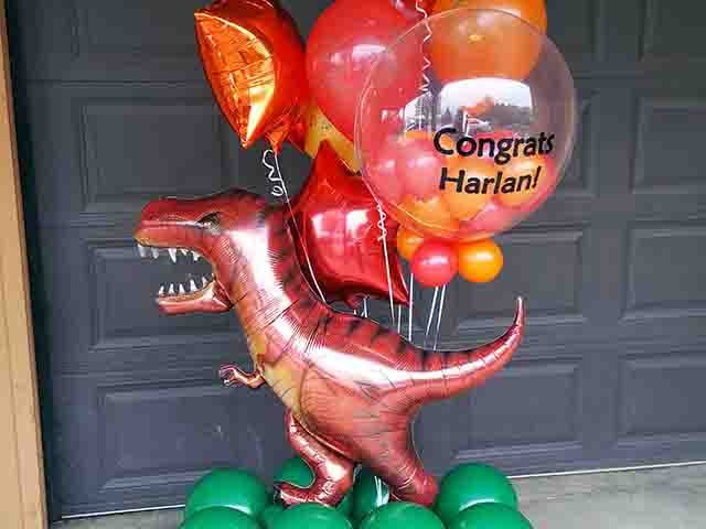 Dinosaur Balloon Marquee with a personalized balloon