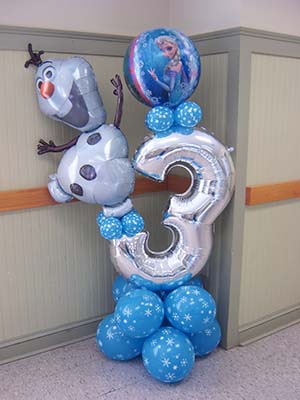 Balloon Design of Frozen theme using an Olaf and Elsa balloon on top of a number 3 balloon